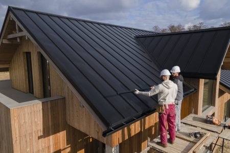full-shot-roofers-working-together-with-helmets (1)